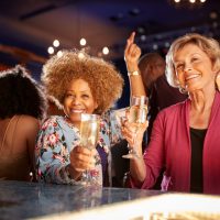 portrait-of-female-senior-friends-drinking